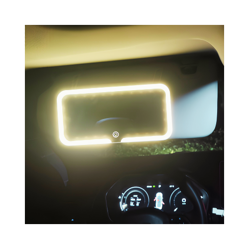 Forged Crown illuminated visor mirror in use inside vehicle showing even lighting for consistent visibility
