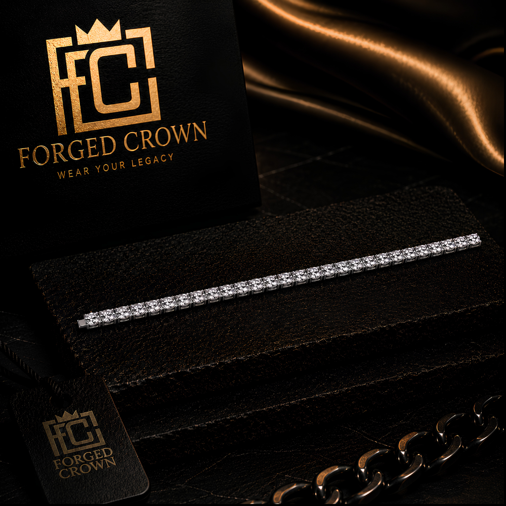 Moissanite Universal Gravitation tennis bracelet in platinum-finished S925 sterling silver, shown on textured black slab with Forged Crown