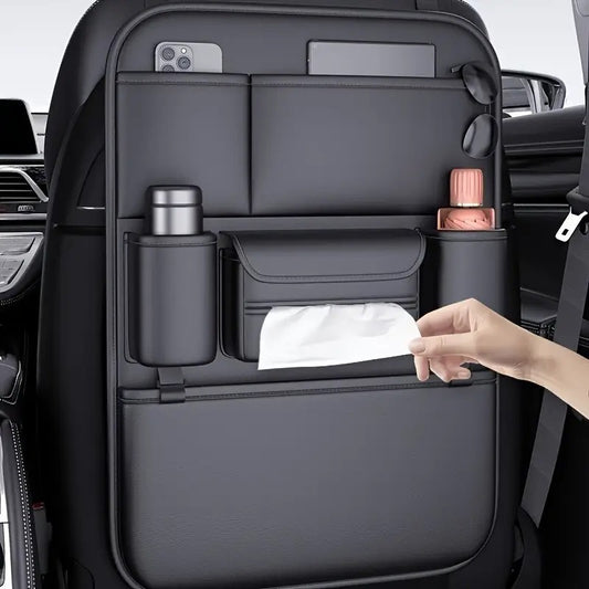 Forged Crown vegan leather seat back organizer installed in vehicle maintaining a clean and organized interior with defined compartments