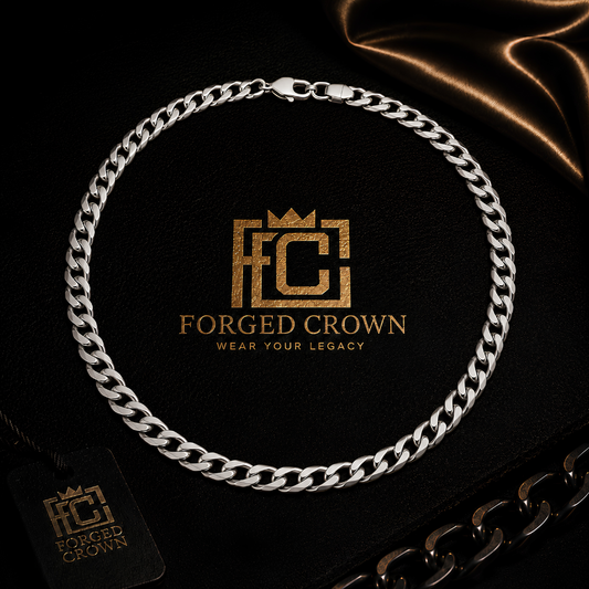 Moissanite curb link chain necklace in S925 sterling silver with platinum finish, displayed on black textured surface with Forged Crown branding