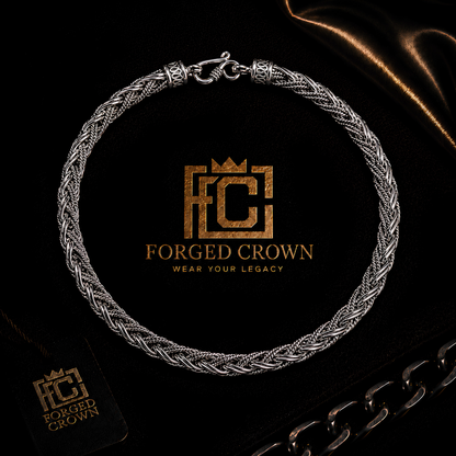 7mm sterling silver rope chain necklace in S925 featuring twisted link design and heavy structured form on a black background with Forged Crown logo.