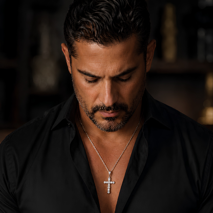 Man wearing a black shirt and The Light of Faith moissanite cross necklace in S925 sterling silver with platinum finish featuring structured stone setting. Forged Crown