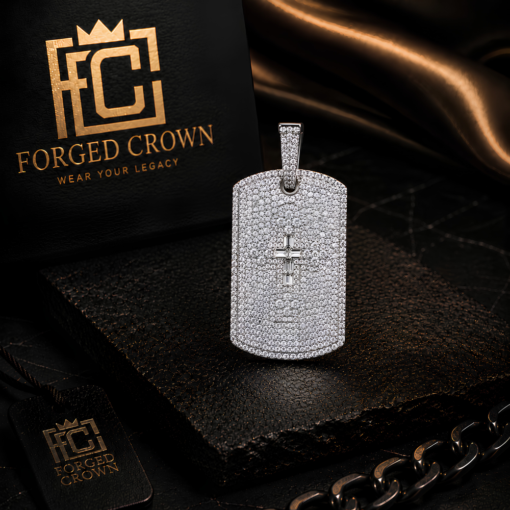 Moissanite pendant in S925 sterling silver with platinum finish featuring integrated cross form displayed on a dark surface with 'Forged Crown' branding.