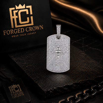 Moissanite pendant in S925 sterling silver with platinum finish featuring integrated cross form displayed on a dark surface with 'Forged Crown' branding.